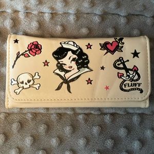 Retro style wallet with sailor graphics